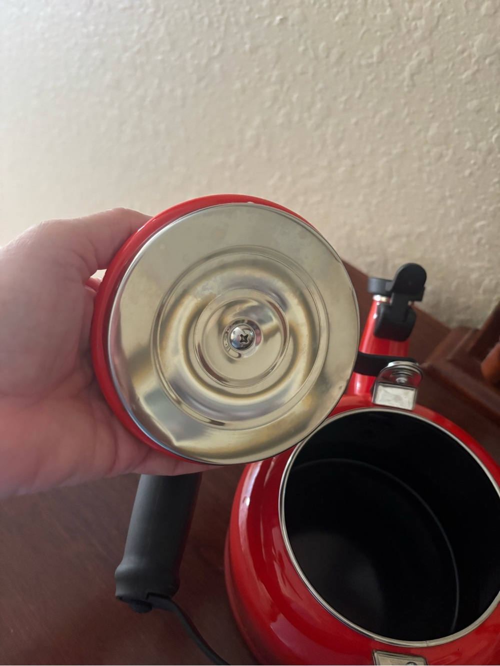 Le Creuset Demi Tea Kettle in the color Cerise (Cherry Red). ® - Picture 4 of 13